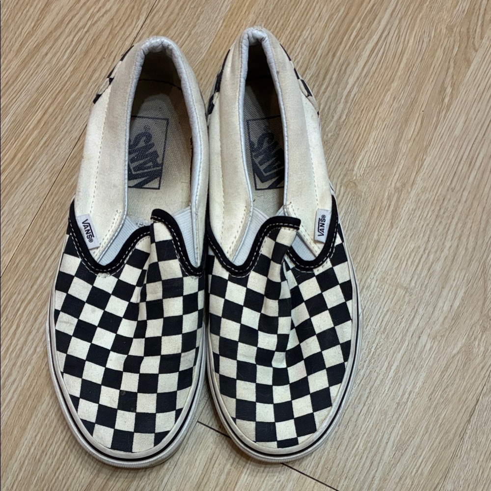 Vans Black and White Checkerboard Slip-On Sneakers